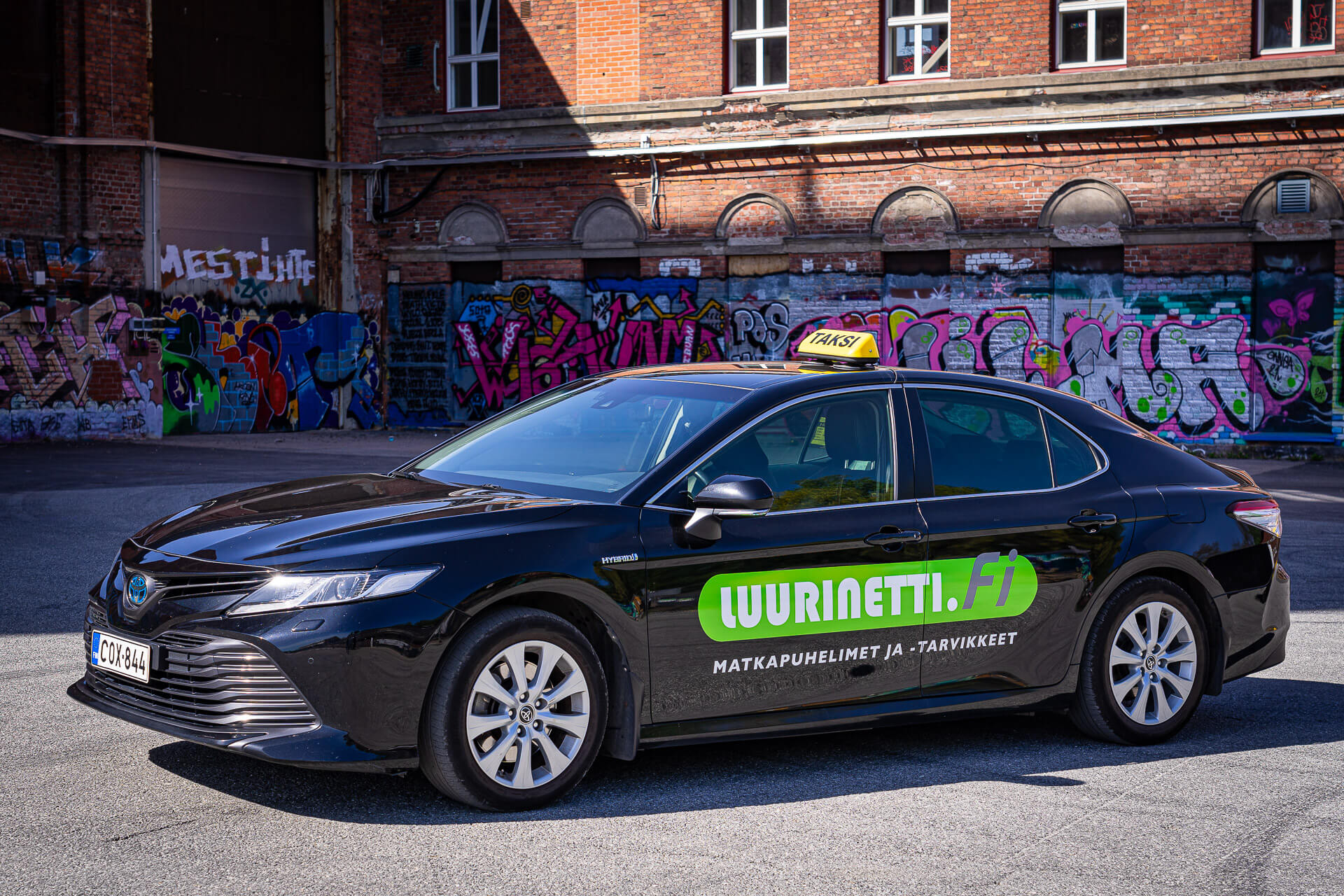 Reissuesan taksi Toyota Camry Hybrid